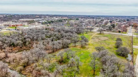an aerial view of residential building and lake view