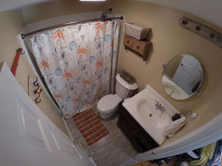 1 Pokesit Road Pocasset, MA 02559 - Photo 12 of 16 a bathroom with a sink mirror and toilet