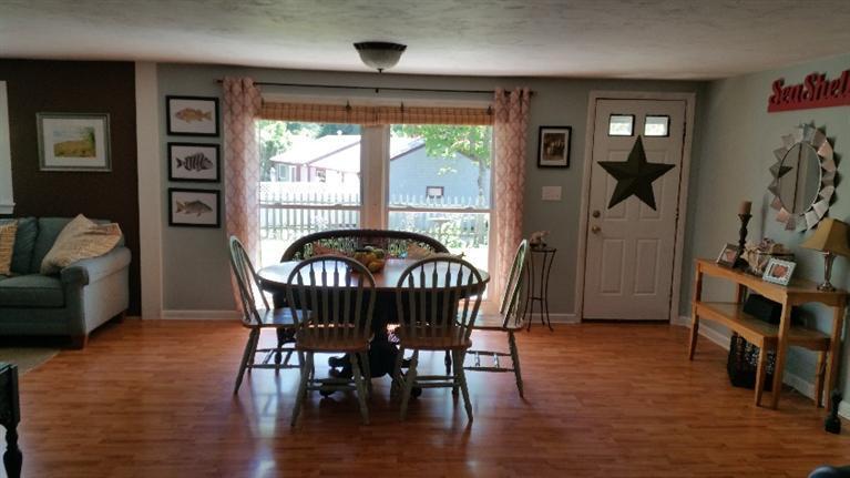 1 Pokesit Road Pocasset, MA 02559 - Photo 3 of 16 a view of a dining room with furniture window and wooden floor