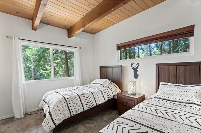 a kitchen with a refrigerator and a sink