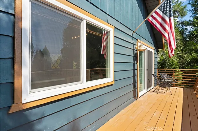 a kitchen with a window a sink and cabinets