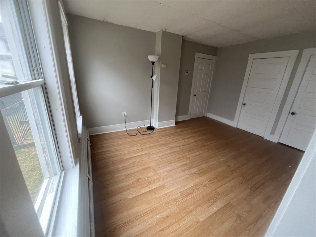 349 Main Street, Unit 2 Douglas, MA 01516 - Photo 5 of 11 a view of an empty room and a window