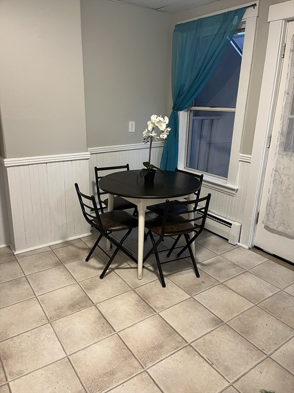 349 Main Street, Unit 2 Douglas, MA 01516 - Photo 9 of 11 a dining room with furniture and chandelier