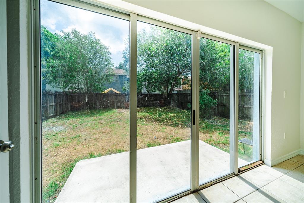 845 Southwest 6th Court Homestead, FL 33034 - Photo 12 of 30 a view of a room with a large window
