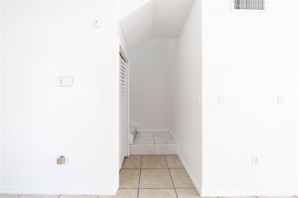 845 Southwest 6th Court Homestead, FL 33034 - Photo 16 of 30 a hallway with a white door