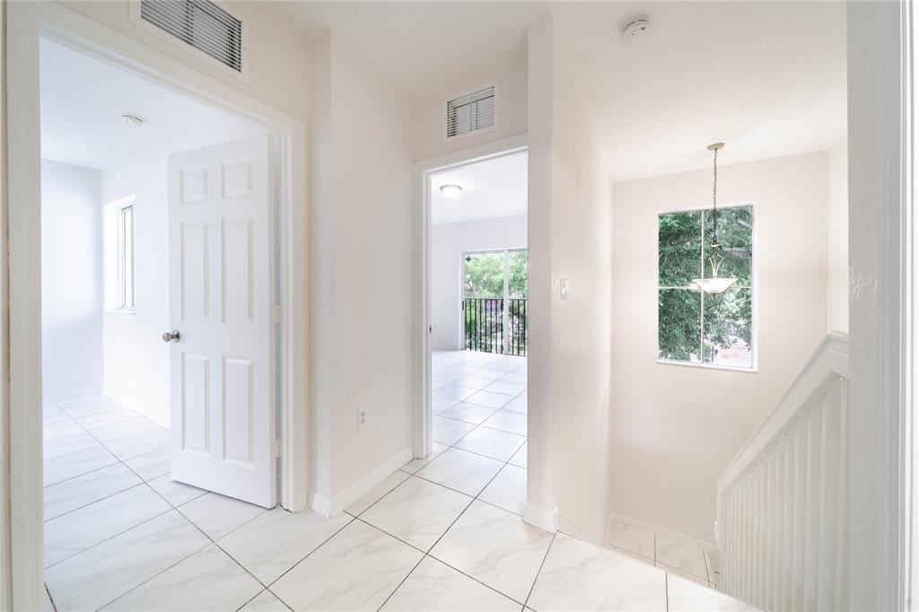 845 Southwest 6th Court Homestead, FL 33034 - Photo 20 of 30 a view of entryway with window and hardwood floor