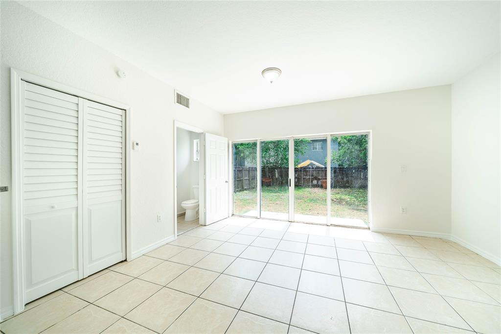 845 Southwest 6th Court Homestead, FL 33034 - Photo 7 of 30 a view of an empty room and window