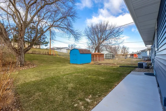 a view of a yard with an outdoor space