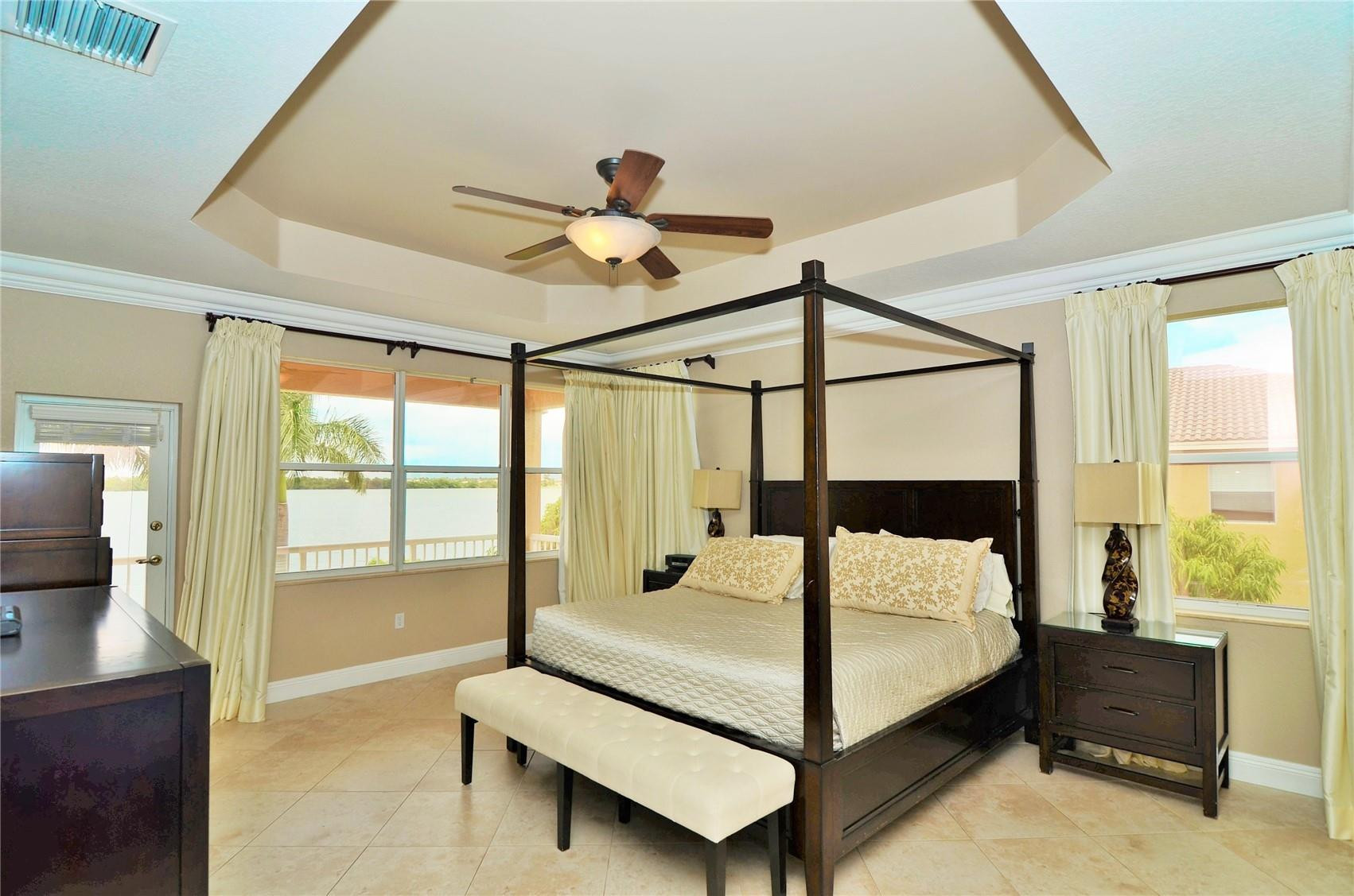 5436 Southwest 191st Terrace Miramar, FL 33029 - Photo 13 of 25 a bedroom with a bed and large window