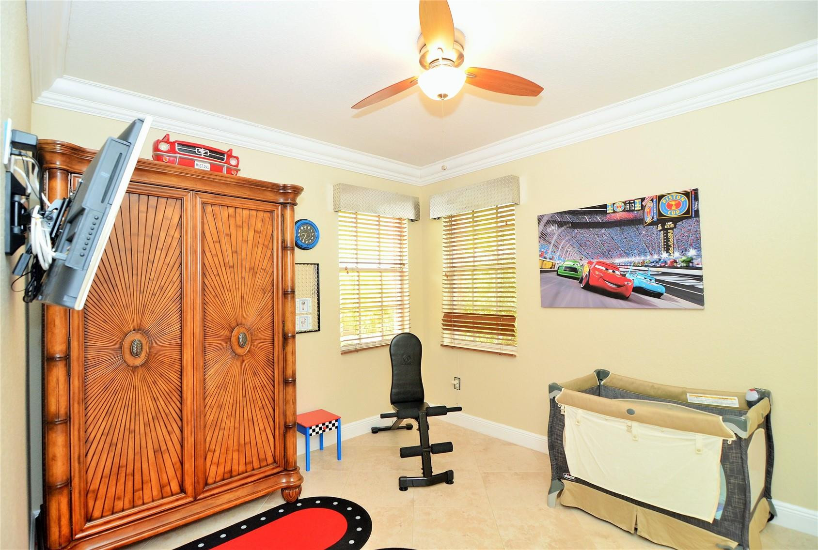 5436 Southwest 191st Terrace Miramar, FL 33029 - Photo 19 of 25 a view of a workspace with furniture and a window