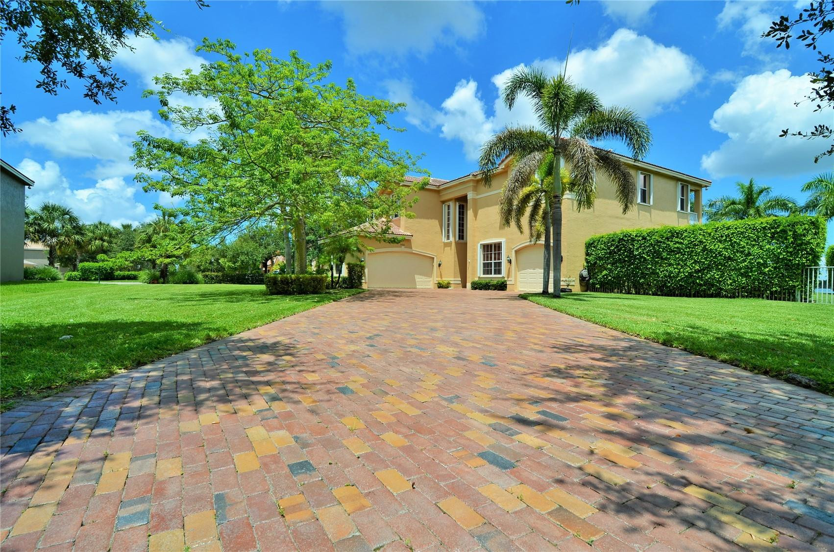 5436 Southwest 191st Terrace Miramar, FL 33029 - Photo 2 of 25 a front view of a house with a yard