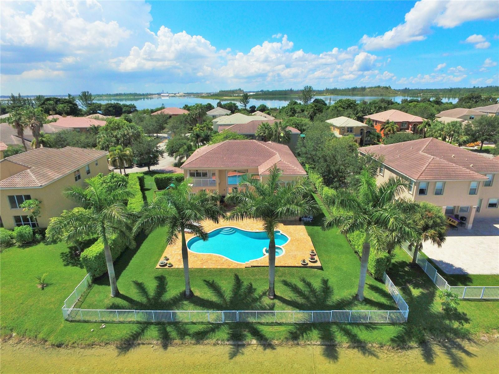 5436 Southwest 191st Terrace Miramar, FL 33029 - Photo 3 of 25 an aerial view of residential houses with outdoor space and lake view