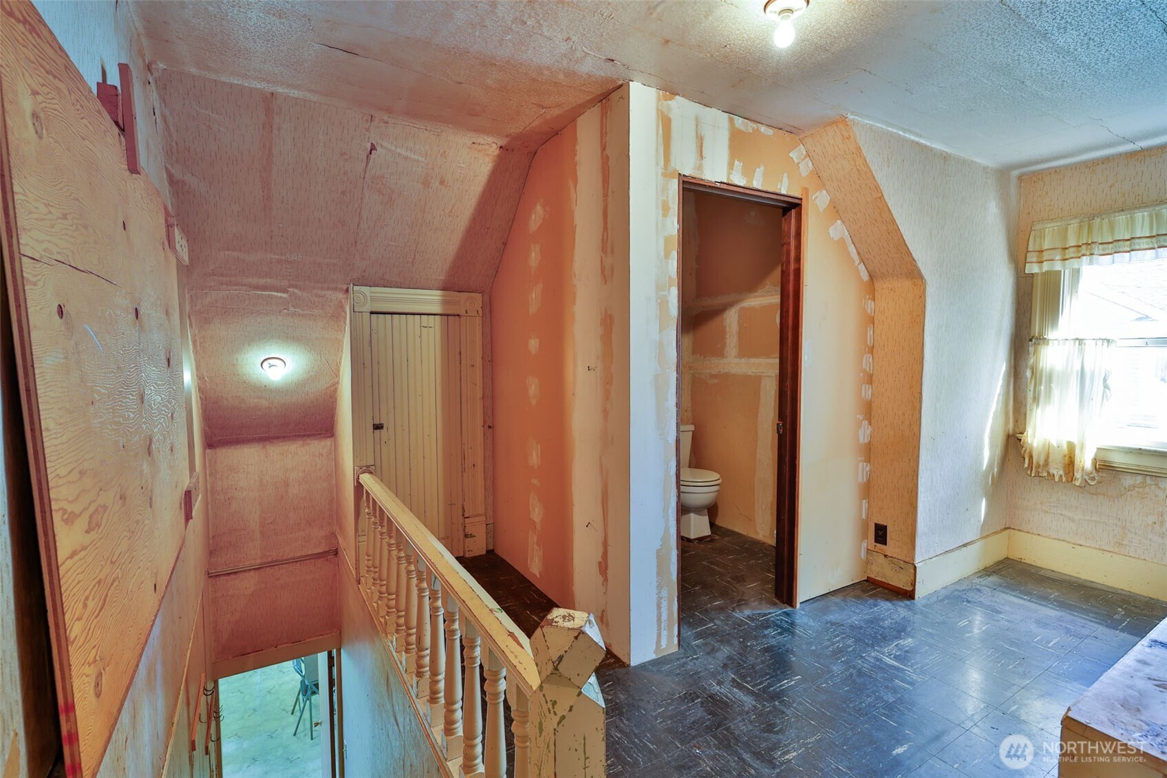 401 K Street Hoquiam, WA 98550 - Photo 13 of 19 a view of entryway with wooden floor and stairs