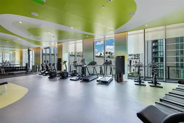 a view of a room with gym equipment