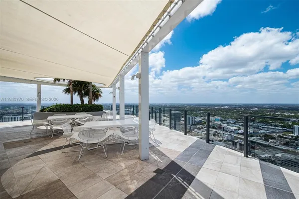 a view of a terrace with chairs