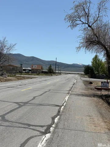a view of a yard with an outdoor space