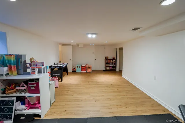 a view of a room with storage and utility room