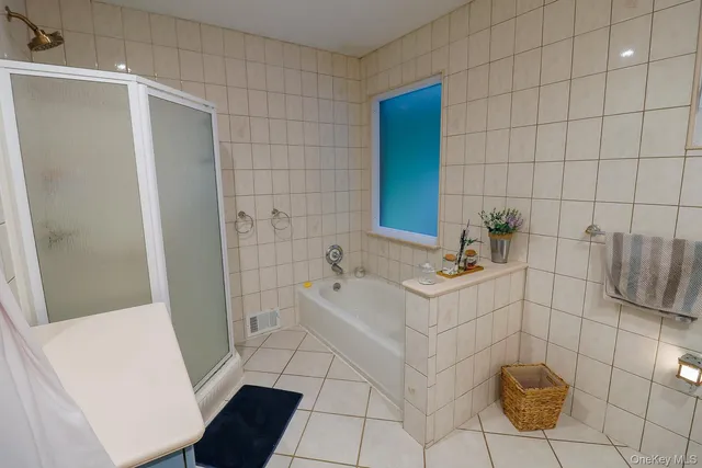 a bathroom with a sink and a shower