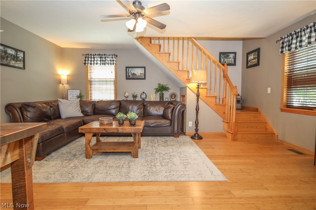 38610 Spiedel Town Road Bethesda, OH 43719 - Photo 14 of 33 Living room featuring light hardwood / wood-style floors and ceiling fan