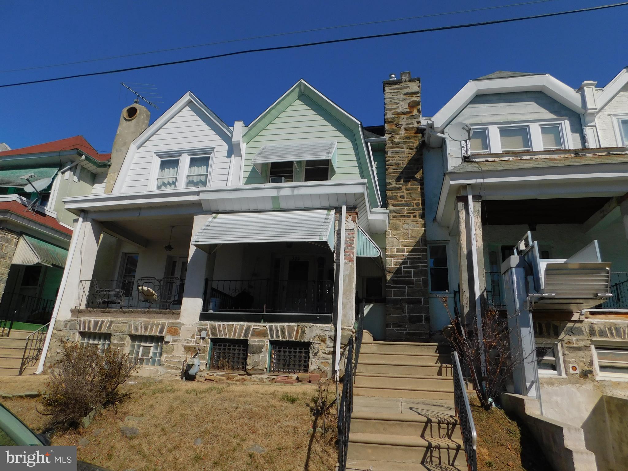 229 Huntley Road Upper Darby, PA 19082 - Photo 1 of 17 a front view of a house with garage
