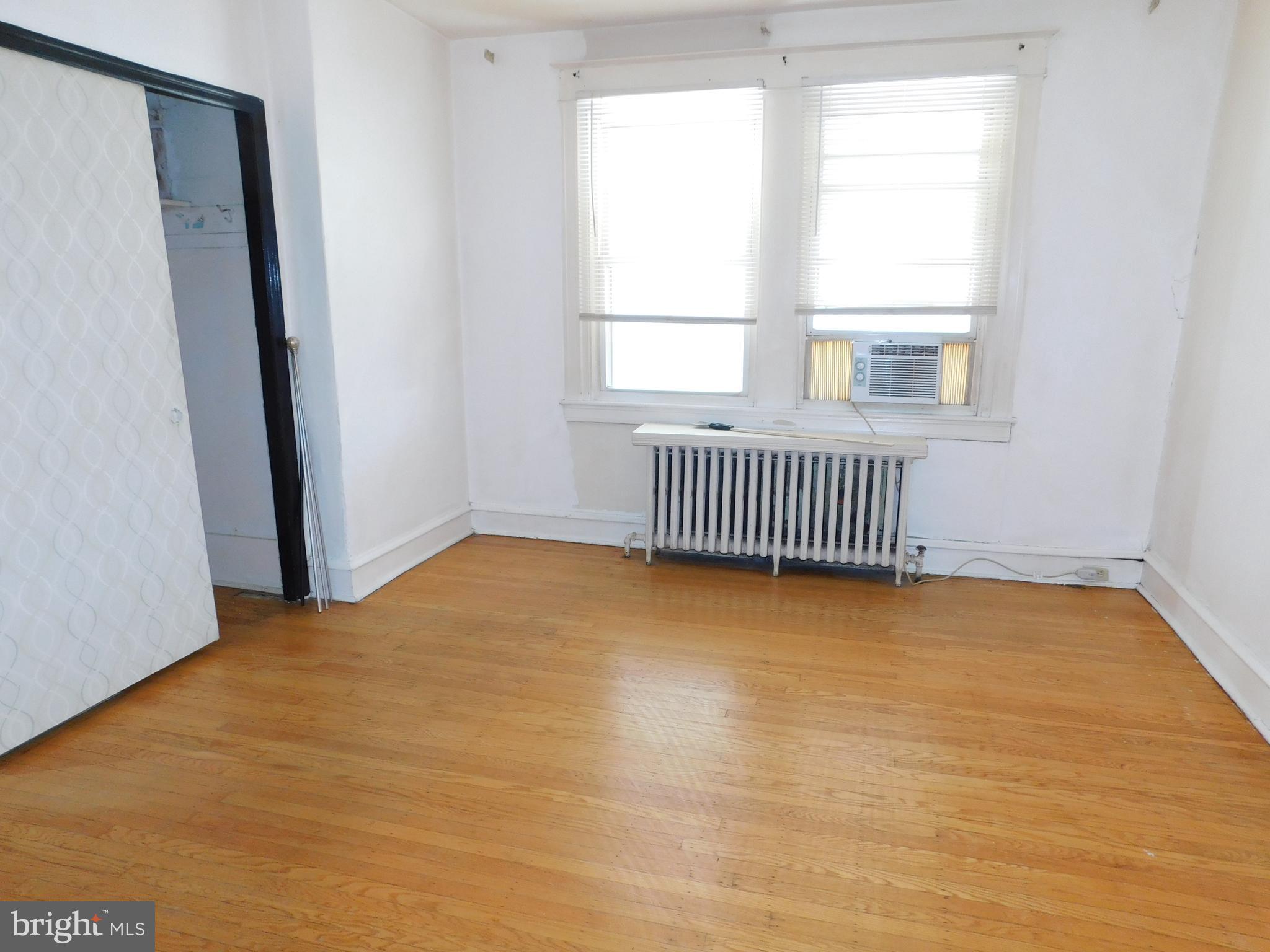 229 Huntley Road Upper Darby, PA 19082 - Photo 10 of 17 a view of an empty room with glass door