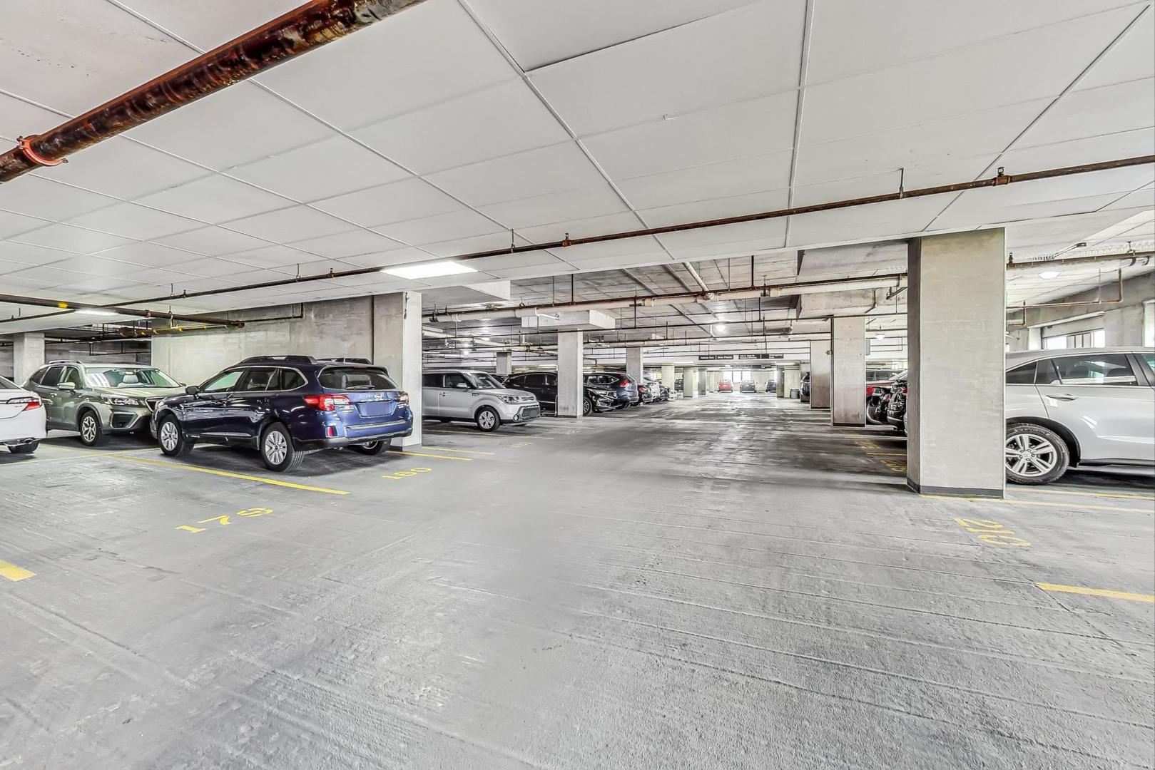 1155 South State Street, Unit C404 Chicago, IL 60605 - Photo 17 of 18 a view of parking space with parked cars