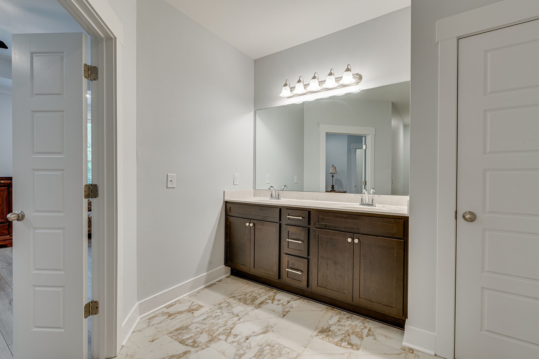 2125 Halfmoon Way Murfreesboro, TN 37130 - Photo 25 of 33 a spacious bathroom with a double vanity sink and a mirror