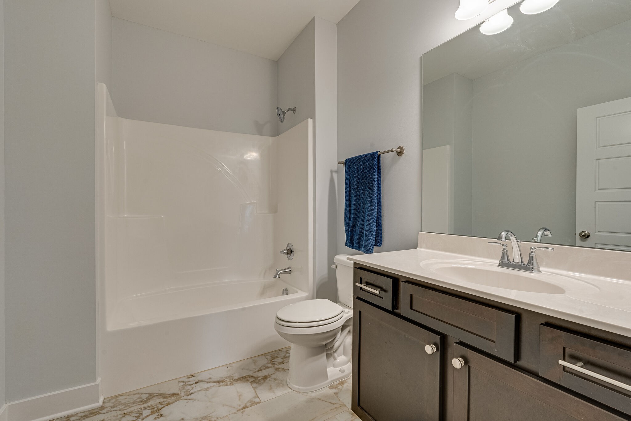 2125 Halfmoon Way Murfreesboro, TN 37130 - Photo 28 of 33 a bathroom with a sink a toilet and a large mirror