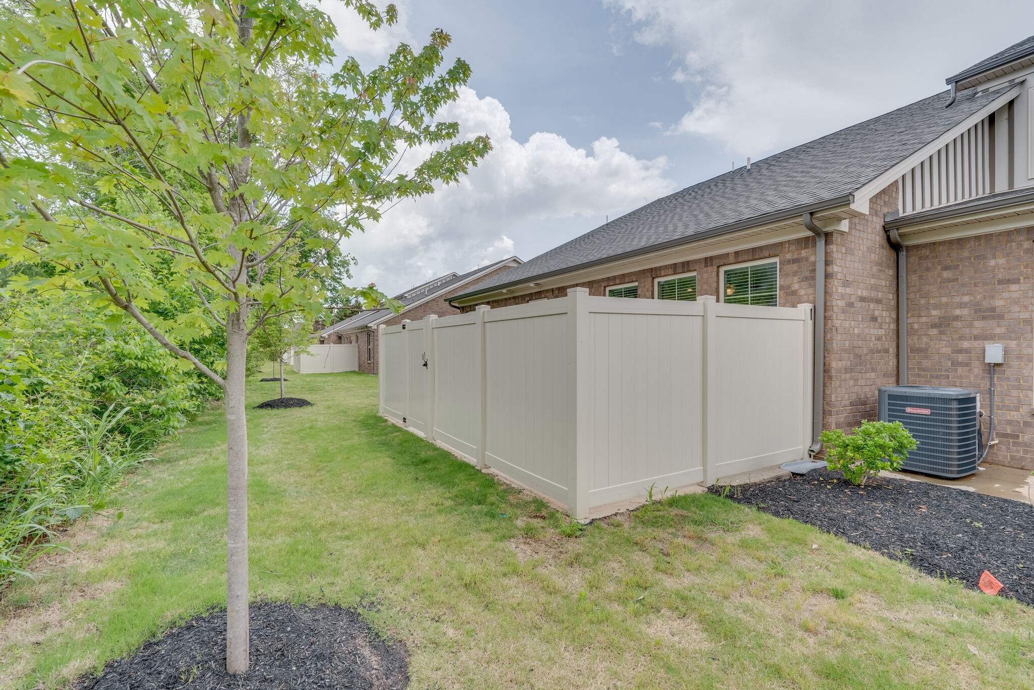 2125 Halfmoon Way Murfreesboro, TN 37130 - Photo 29 of 33 a backyard of a house with plants and garden