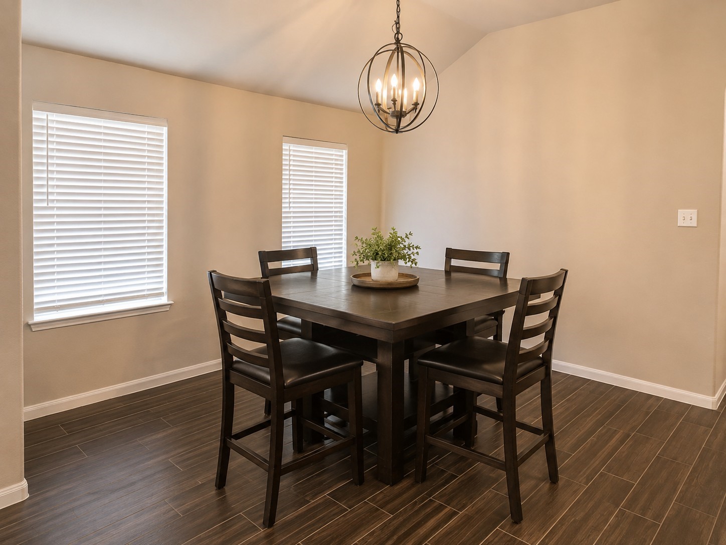 Dining area is open to the kitchen and family room (AI Furnished)