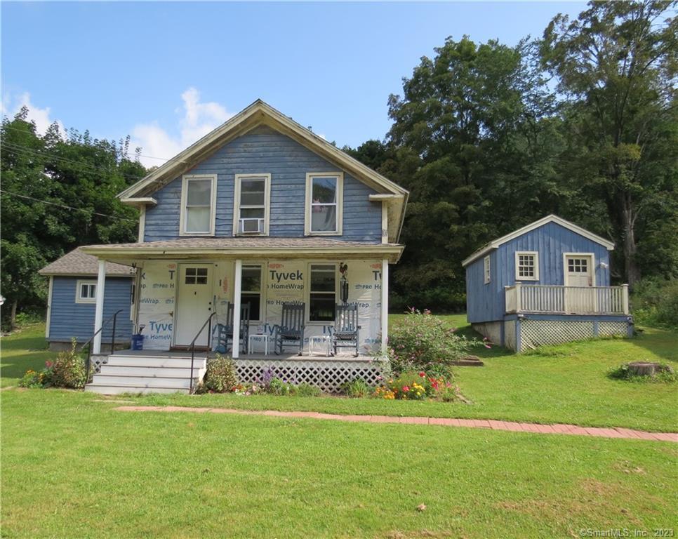 366 Greenwoods Road West Norfolk, CT 06058 - Photo 1 of 1 a front view of house with yard and green space
