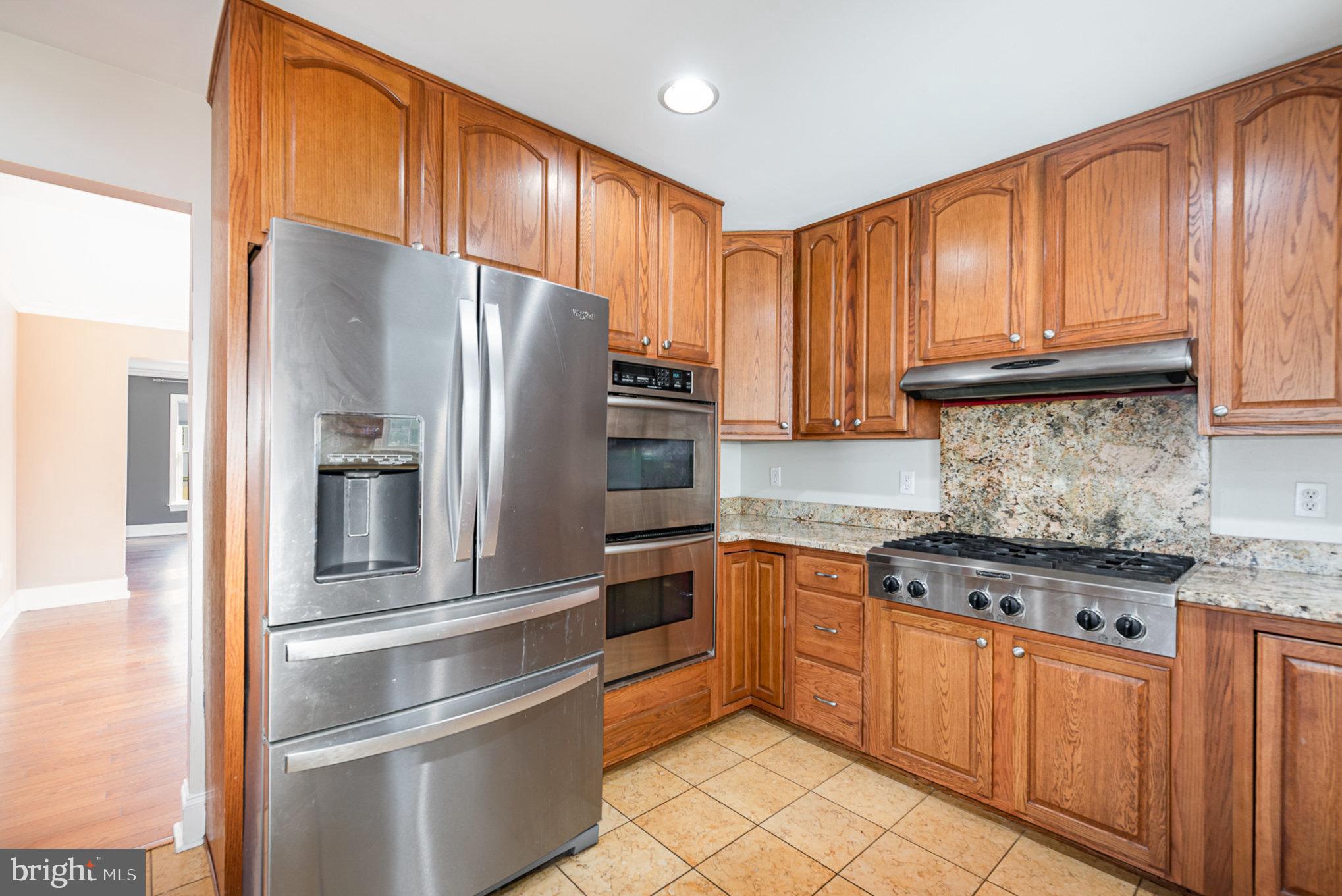 4617 Forge Road Perry Hall, MD 21128 - Photo 17 of 44 a kitchen with granite countertop stainless steel appliances and cabinets
