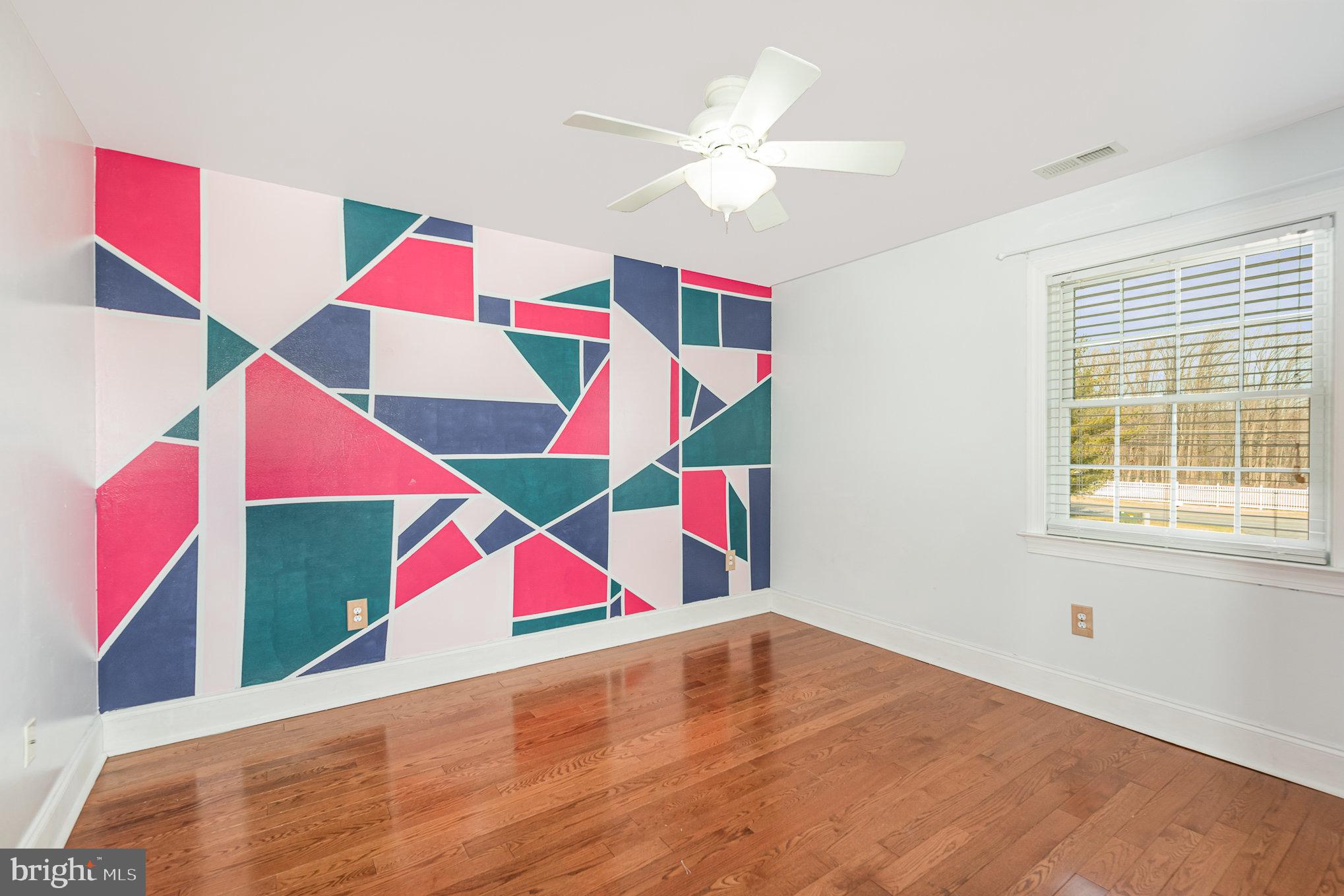 4617 Forge Road Perry Hall, MD 21128 - Photo 27 of 44 a room that has a bed and a white walls