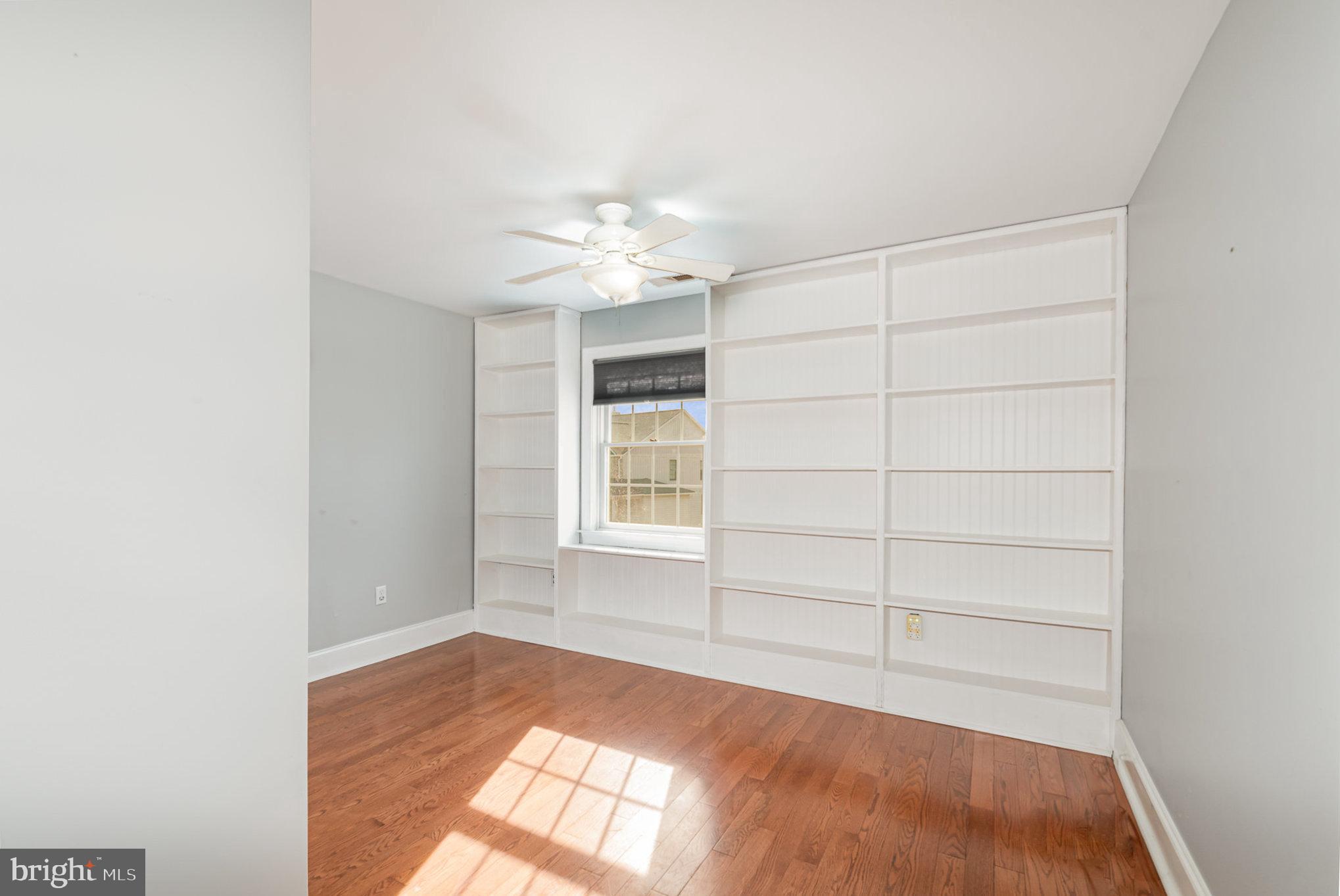 4617 Forge Road Perry Hall, MD 21128 - Photo 28 of 44 an empty room with cabinet and windows