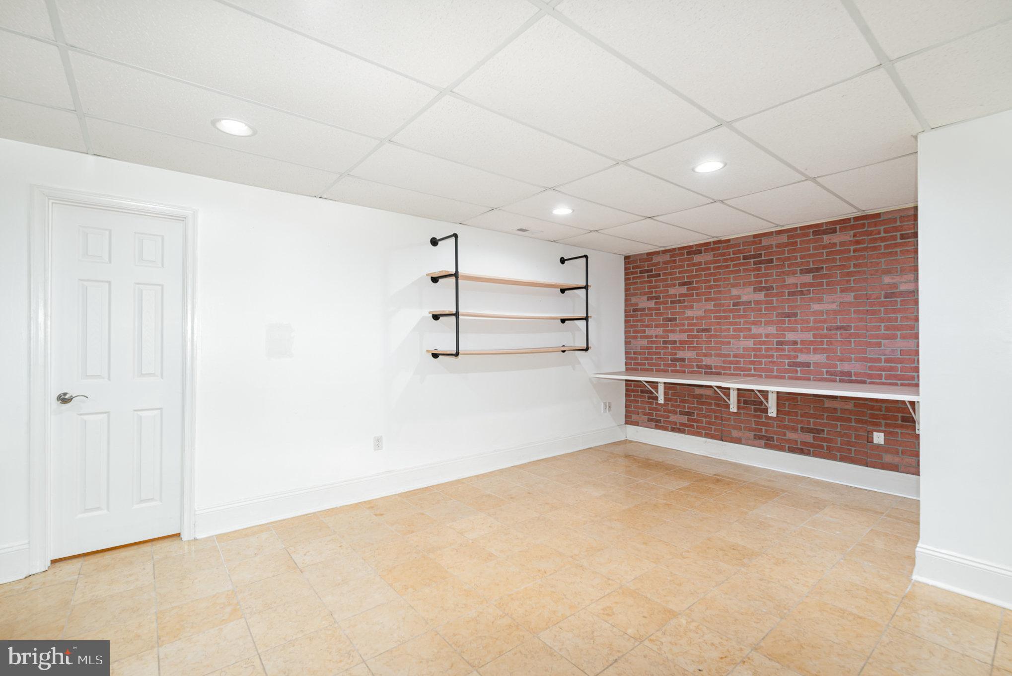 4617 Forge Road Perry Hall, MD 21128 - Photo 32 of 44 a view of an empty room with a window