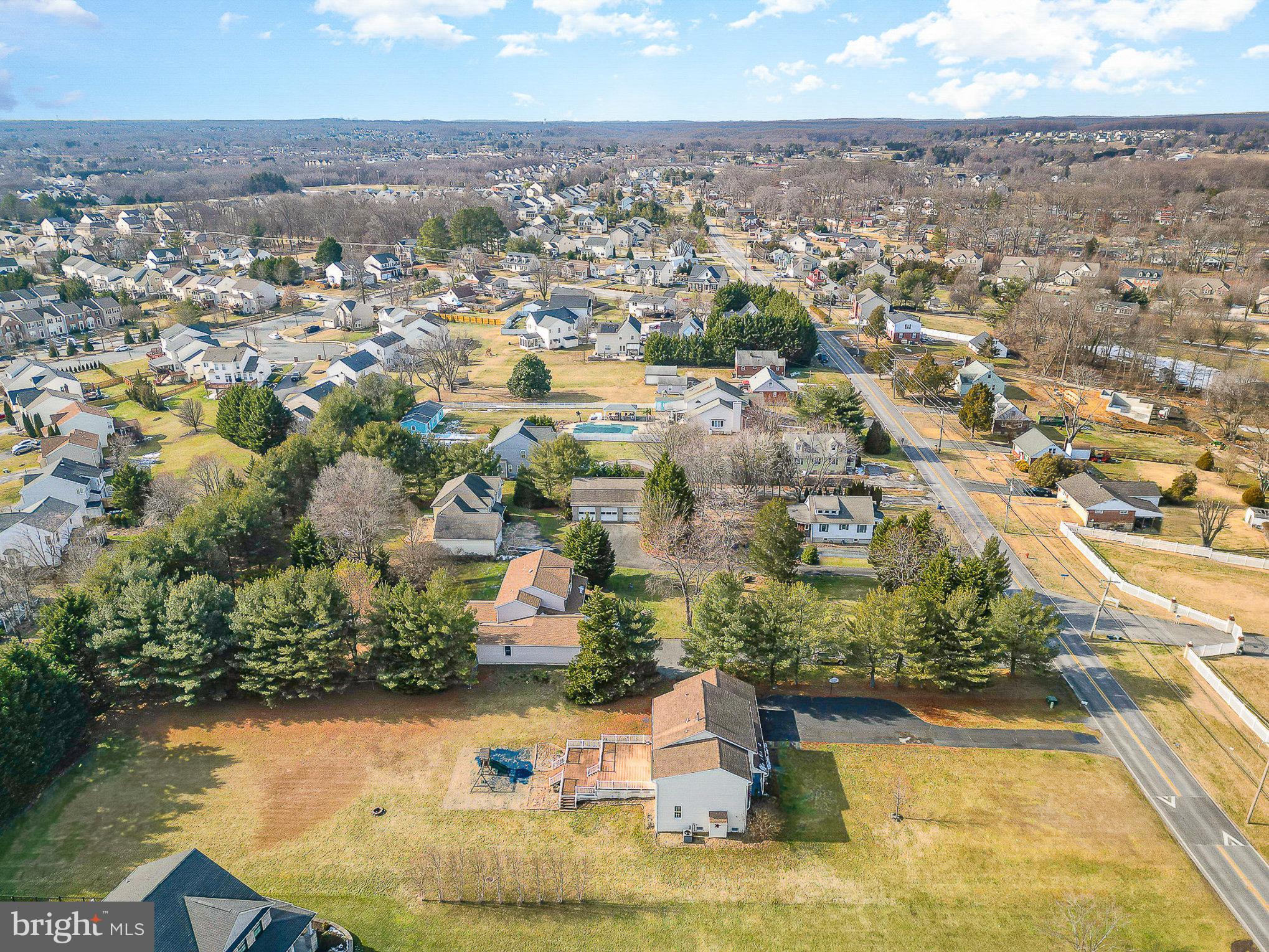 4617 Forge Road Perry Hall, MD 21128 - Photo 41 of 44 an aerial view of residential houses with outdoor space and swimming pool