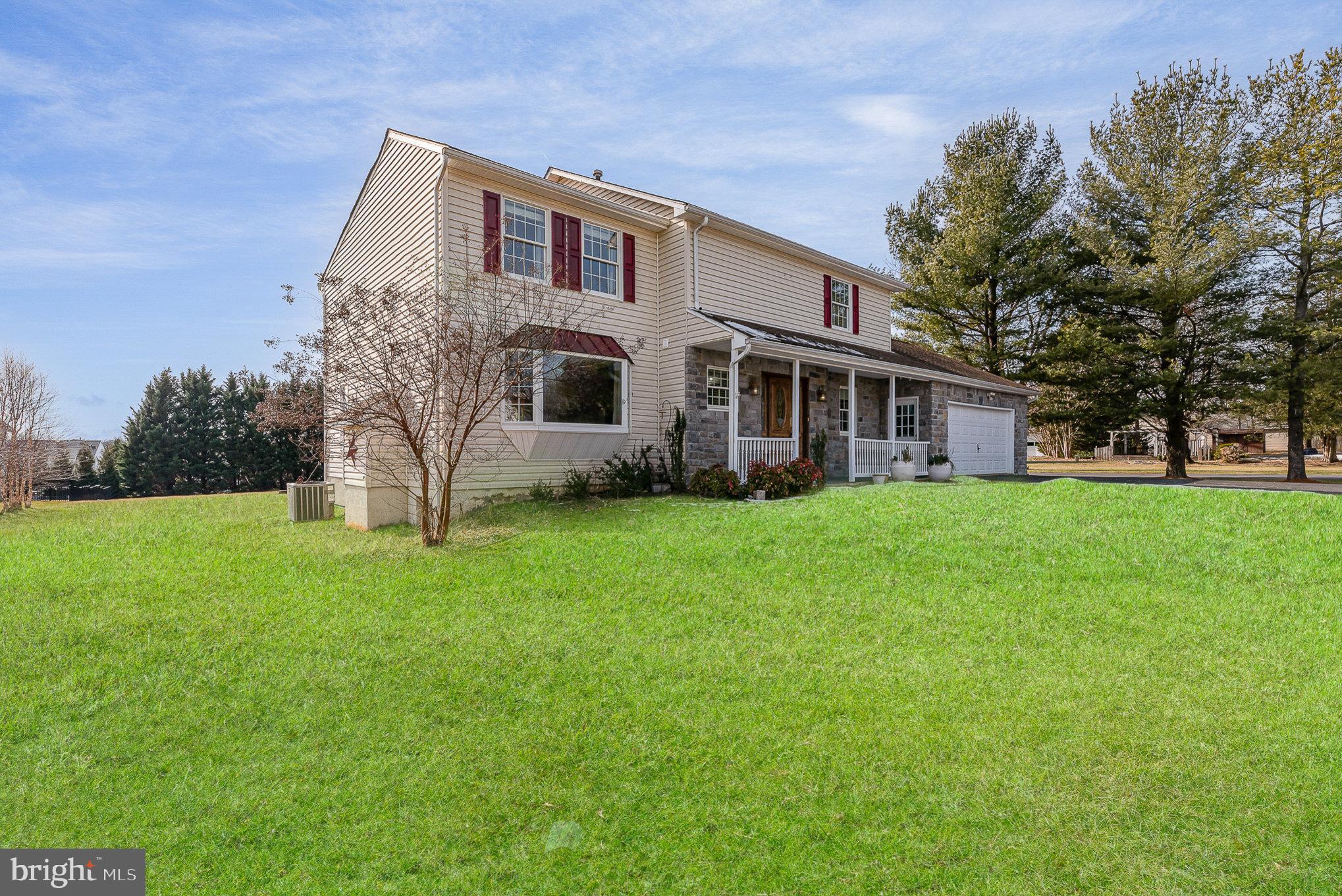 4617 Forge Road Perry Hall, MD 21128 - Photo 5 of 44 a front view of house with a garden