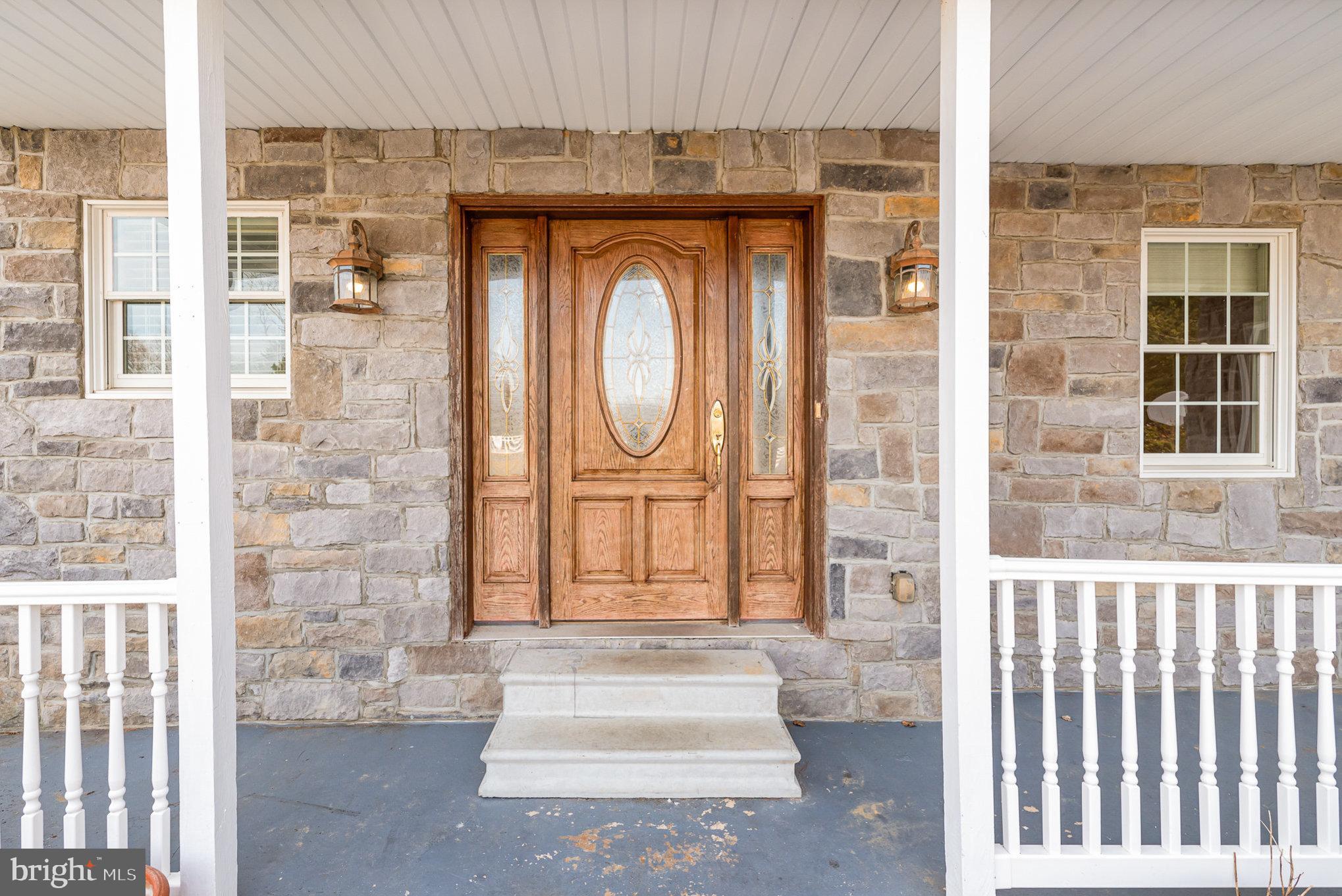 4617 Forge Road Perry Hall, MD 21128 - Photo 7 of 44 a front view of a house with large windows