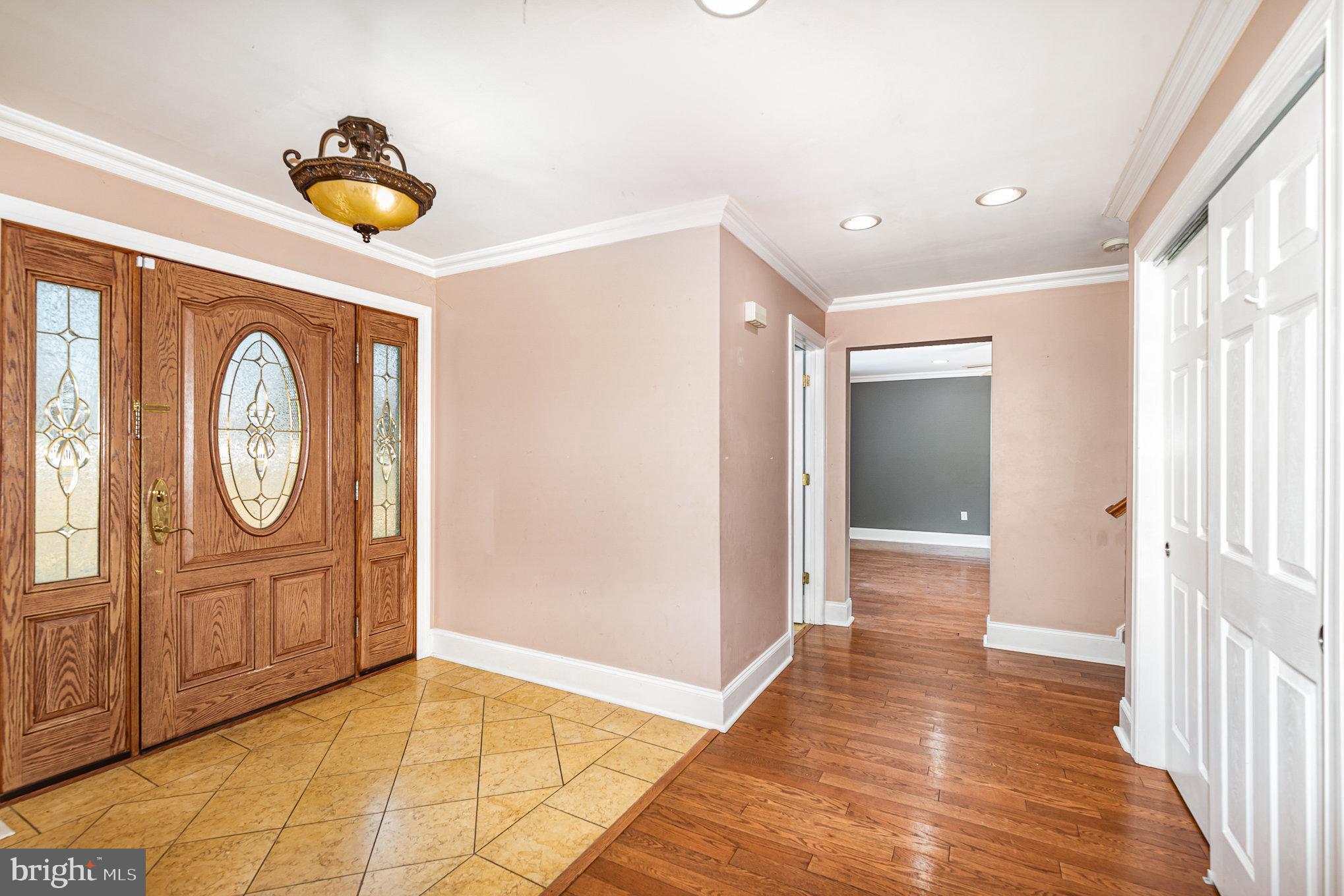 4617 Forge Road Perry Hall, MD 21128 - Photo 8 of 44 a view of a hallway with wooden floor