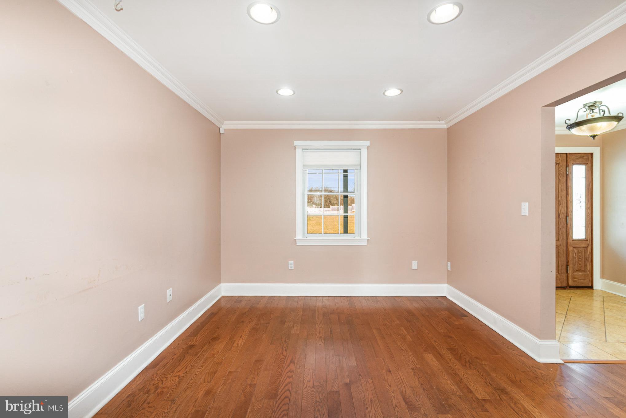 4617 Forge Road Perry Hall, MD 21128 - Photo 9 of 44 wooden floor in an empty room with a window
