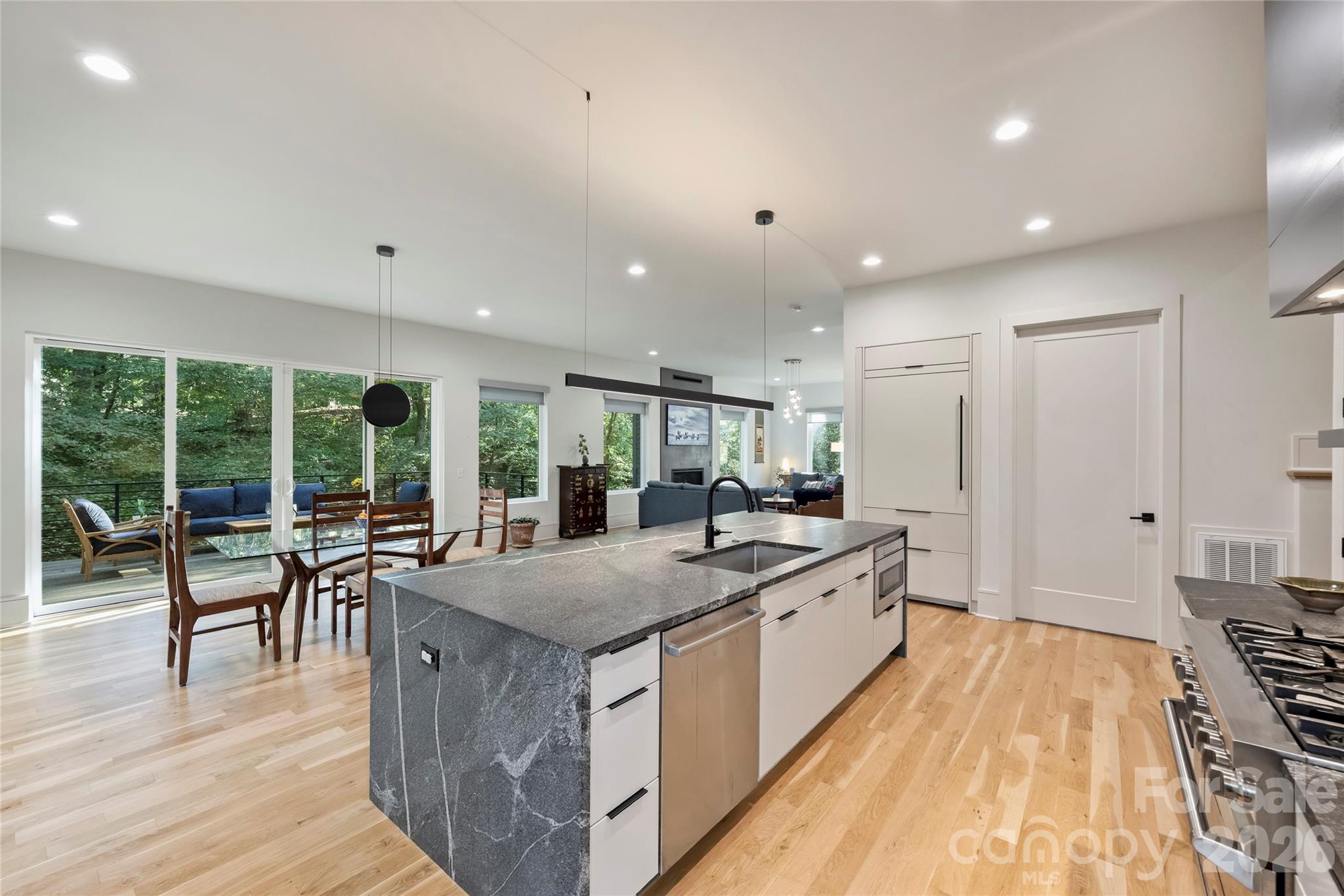 7223 Terrace Drive Charlotte, NC 28211 - Photo 13 of 48 a large kitchen with kitchen island a large island in it