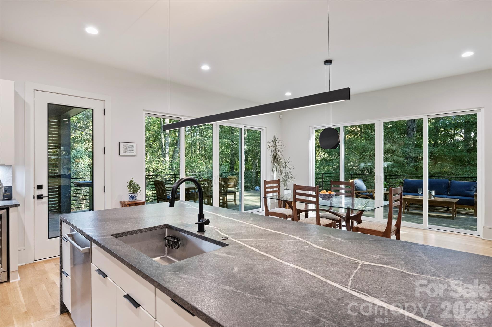 7223 Terrace Drive Charlotte, NC 28211 - Photo 15 of 45 a kitchen with a sink and large window