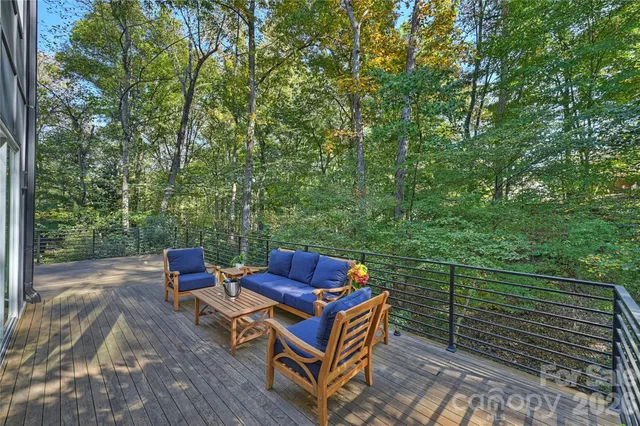 a view of a yard with outdoor seating