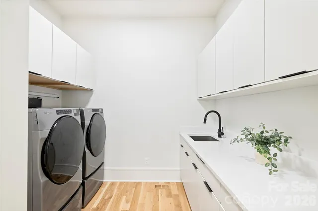 a bathroom with a sink and mirror