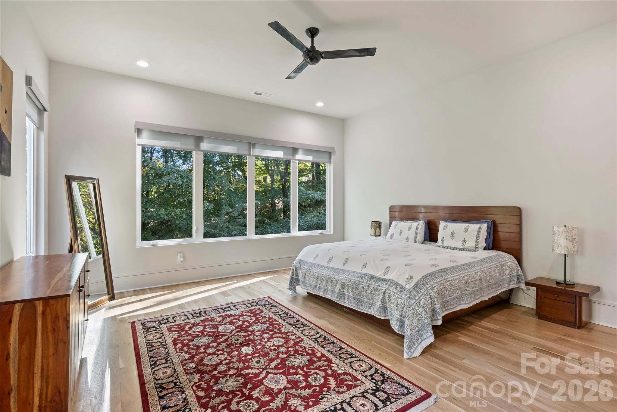 7223 Terrace Drive Charlotte, NC 28211 - Photo 25 of 48 a bedroom with a large bed and a large window