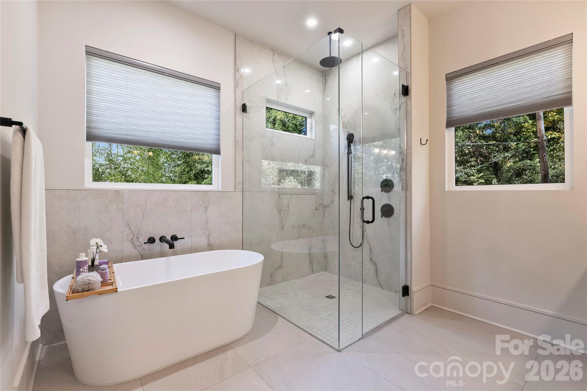 7223 Terrace Drive Charlotte, NC 28211 - Photo 28 of 48 a bathroom with a bathtub and shower