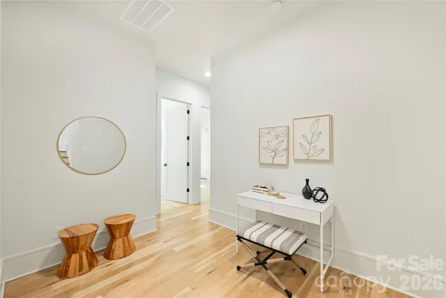 a view of a workspace with furniture