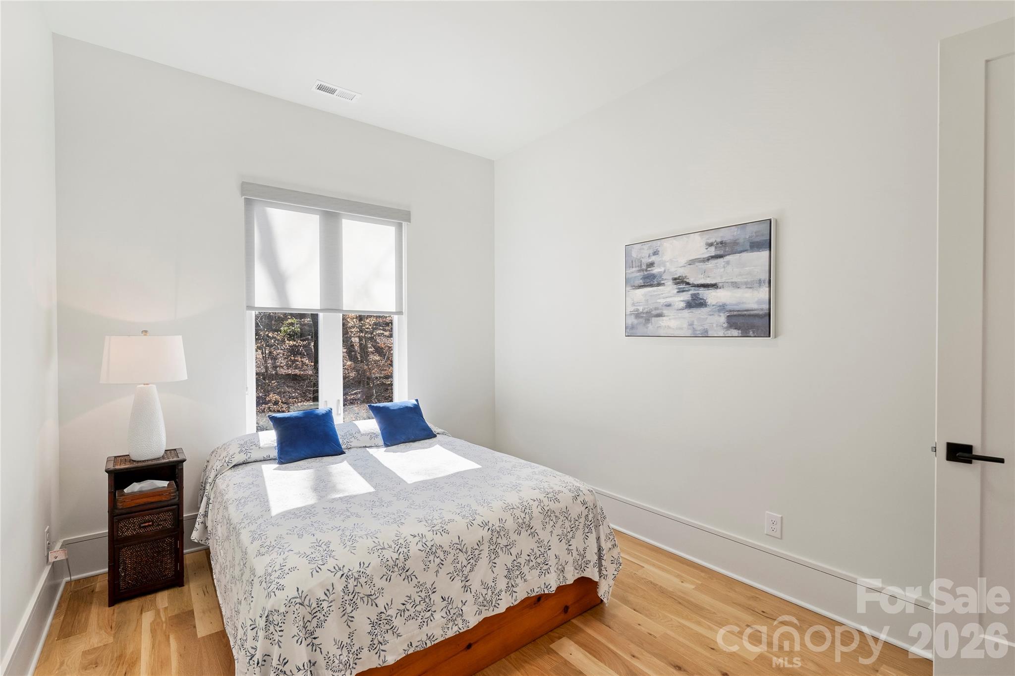 7223 Terrace Drive Charlotte, NC 28211 - Photo 30 of 48 a bedroom with a bed and a window