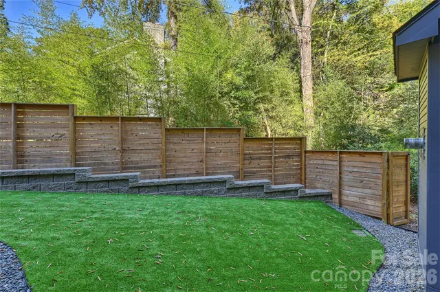 a view of a backyard with stairs