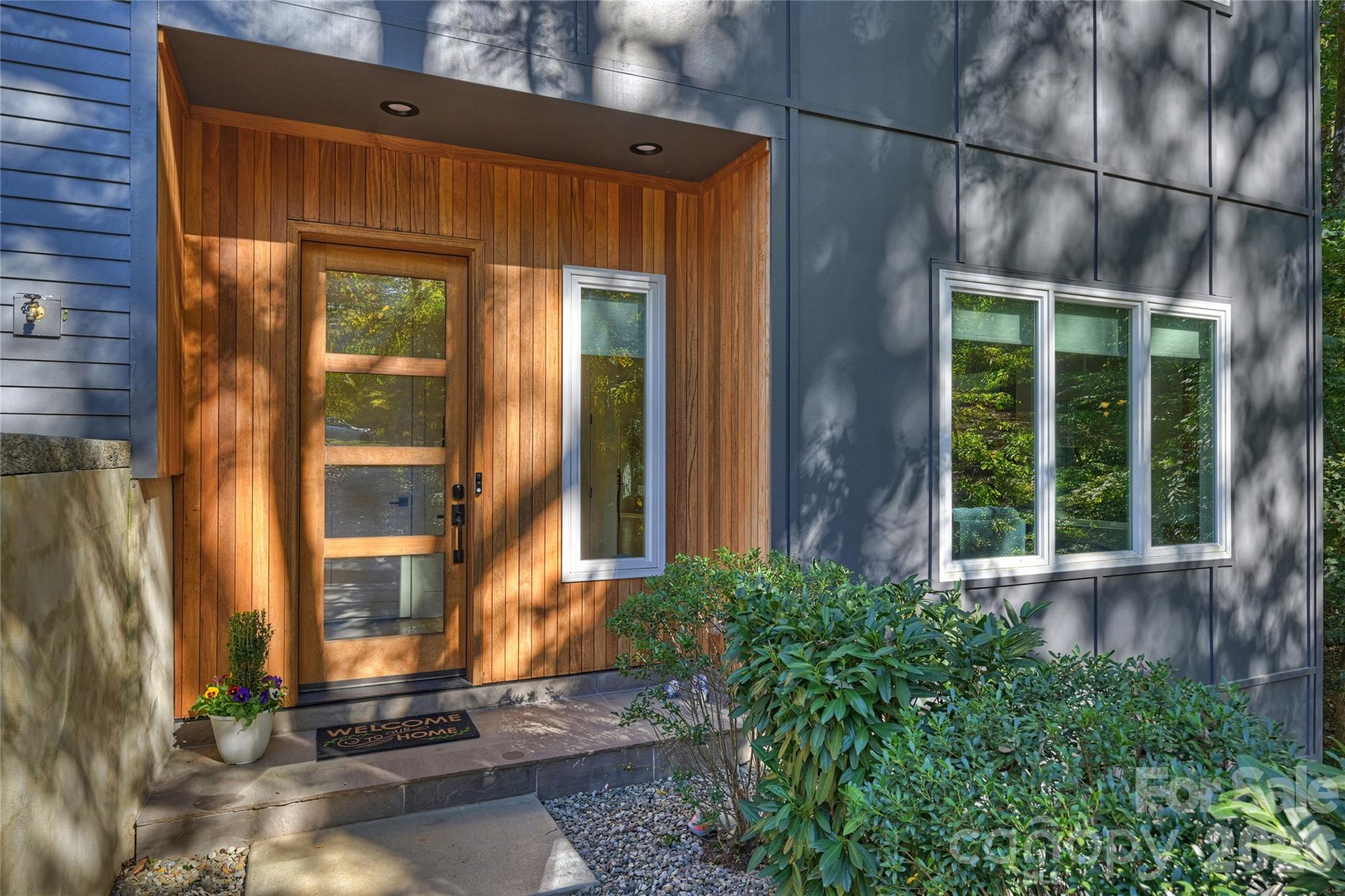 7223 Terrace Drive Charlotte, NC 28211 - Photo 4 of 48 a front view of a house with a yard
